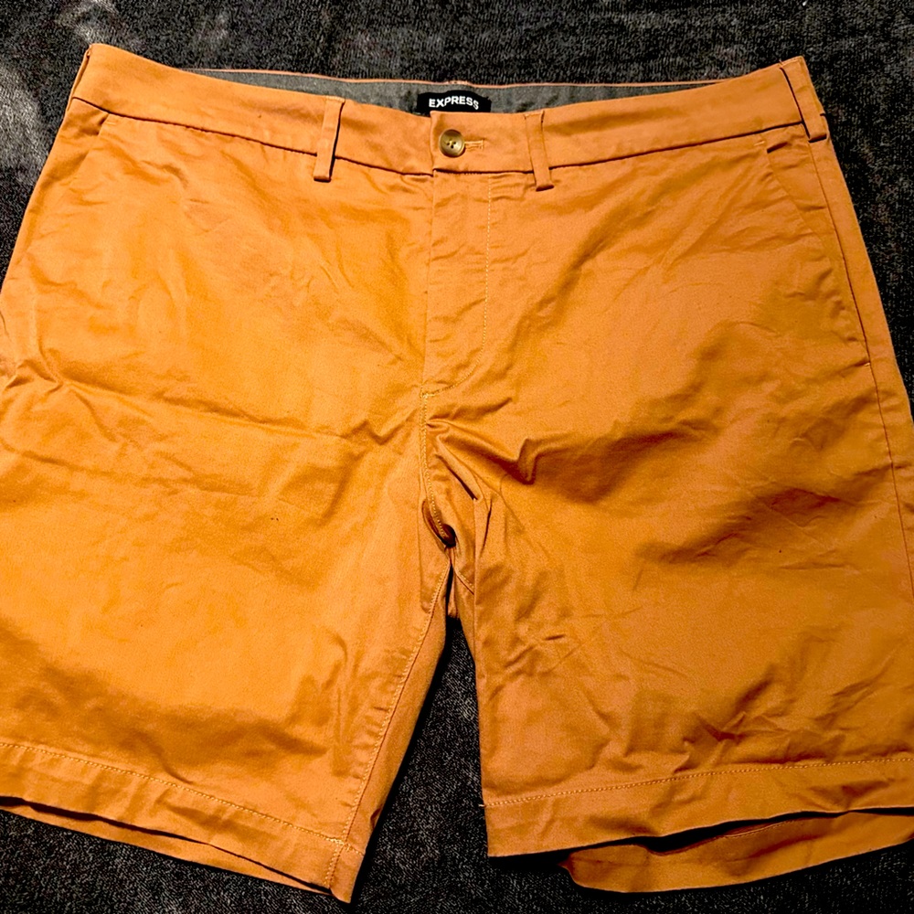 Express Shorts, the color as a light pumpkin…not really orange.